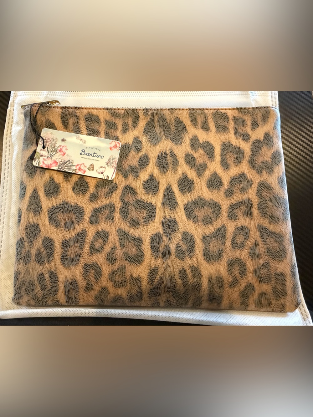 Leopard print clutch pouch zip up hanging tassel inside compartments tan brown